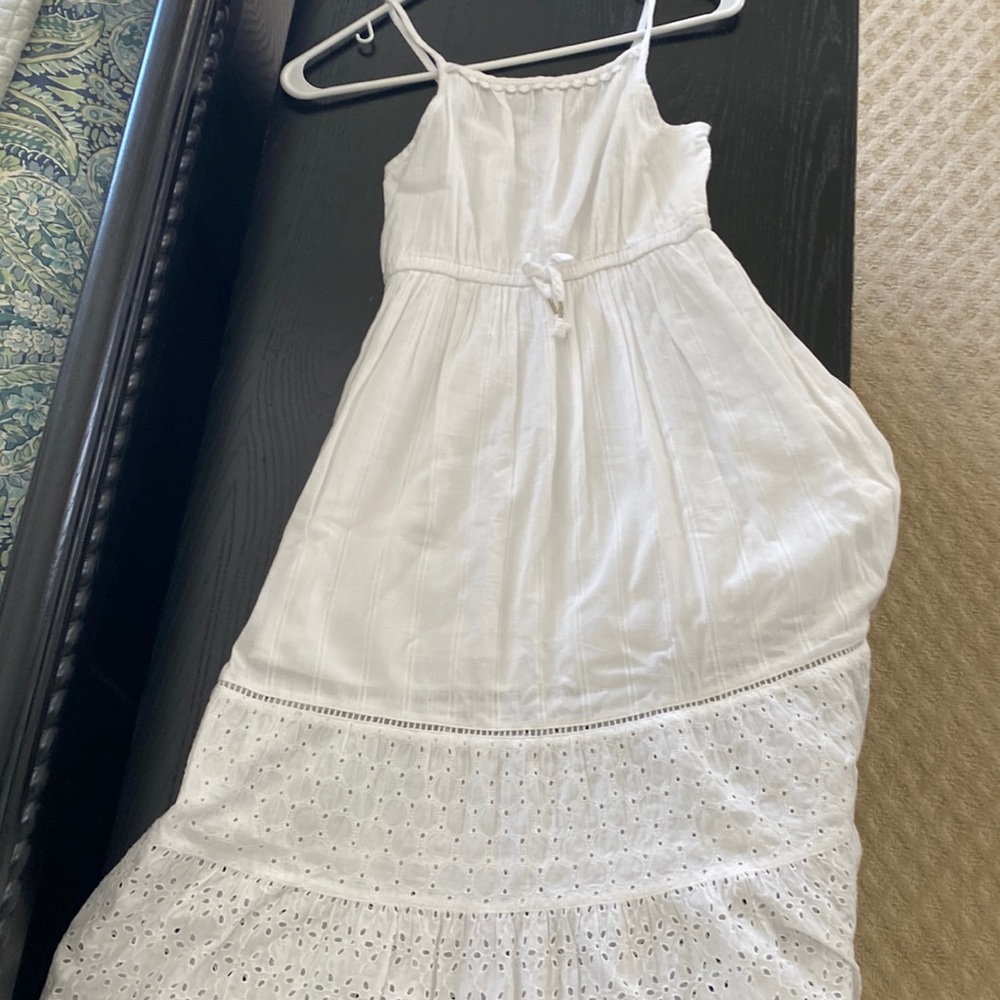 White cotton maxi sundress with eyelet accent.